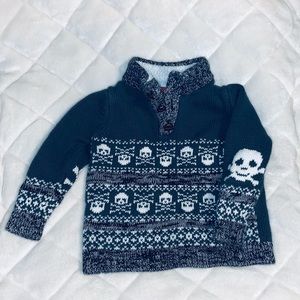 Skull pull over sweater